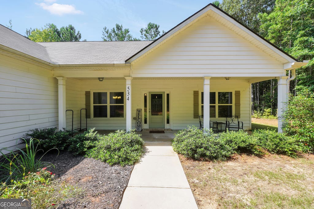 Photo of 534 Giles Road, Forsyth, GA 31029 (MLS # 10818426)