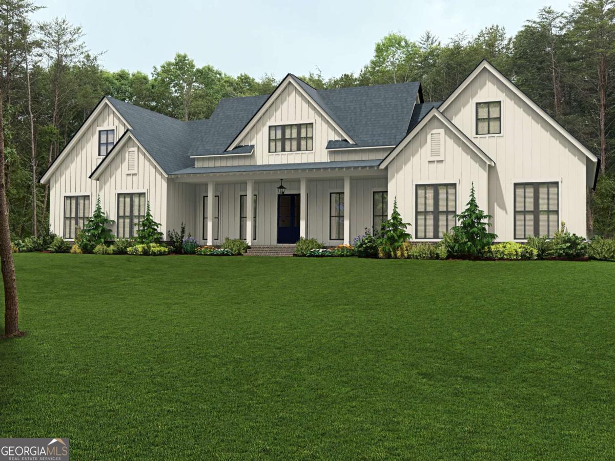Welcome to an extraordinary new construction estate offering over 6,000 square feet of elevated living, nestled on five serene acres in the highly acclaimed Cherokee County School district. Designed for discerning buyers, this luxury home perfectly blends timeless design with modern conveniences. From the moment you arrive, you're greeted by stunning curb appeal featuring elegant gas lanterns, a natural stone rocking chair front porch, and a three-car garage. Step through the front door into a grand two-story vaulted foyer that immediately sets the tone for the home's elegance, then transitions seamlessly into the expansive open living space with soaring 10-foot ceilings, wide-plank hardwoods, and designer finishes throughout. At the heart of the home, a chef's dream kitchen awaits--complete with top-of-the-line Wolf Gas Range, 42" Sub-Zero French Door Refrigerator, custom cabinetry, Kettle Faucet, Wolf Speed Oven and a Wolf Single Oven below. The stunning 10-foot kitchen island serves as the centerpiece of the culinary space, offering generous seating with an extended overhang perfect for casual dining or entertaining. Thoughtfully designed with functionality in mind, it features additional built-in storage on both ends-ideal for keeping serving pieces, cookbooks, or entertaining essentials neatly tucked away yet easily accessible. Just steps away, you will find a large walk-in pantry with custom built-ins and a "Costco" door for easy grocery unloading. A large laundry room with a farmhouse sink and more storage completes this space that makes daily living effortless. Retreat to the luxurious owner's suite with private deck access, hardwood flooring, and a spa-inspired bath with granite double vanities, a free-standing soaking tub, and a generous shower with multiple heads. The custom walk-in closet is a showstopper--offering custom built-ins and enough room to add a center island. Three secondary en suite bedrooms offer walk-in closets, custom shelving, and hardwoods throughout. Upstairs, a private fifth bedroom suite or bonus room provides flexible space for guests, a teen suite, or in-law suite. Entertain with ease from your covered and uncovered back porch, or imagine your dream backyard oasis--perfect for a future sparkling pool, spa-like hot tub, and patio living. With over 2400 square feet of unfinished basement space, there's room to personalize with a wine cellar, media room, gym, or guest suite. With access to top-tier schools and the peace of five private acres, this is refined country living-just minutes from shopping, dining and outdoor recreation.