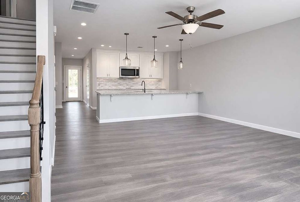 Photo of 215 Maddux Street #LOT 22, Fayetteville, GA 30214 (MLS # 10760128)