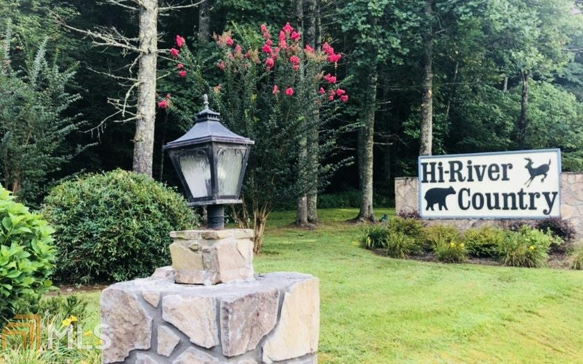 Located at the front of the highly sought after Hi-River Country Subdivision. Beautiful tract of land just waiting for someone to make it their home. Please note- Community water system is $45.00 a month per lot.