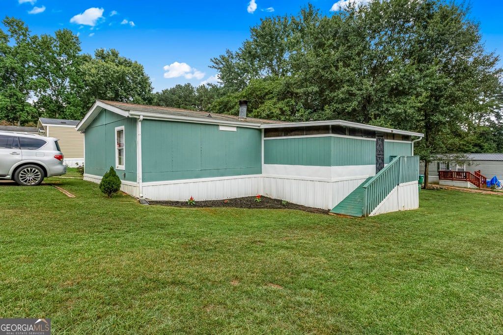 Photo of 113 Benji trail &amp; Anderson Mill Drive, Snellville, GA 30039 (MLS # 10804075)
