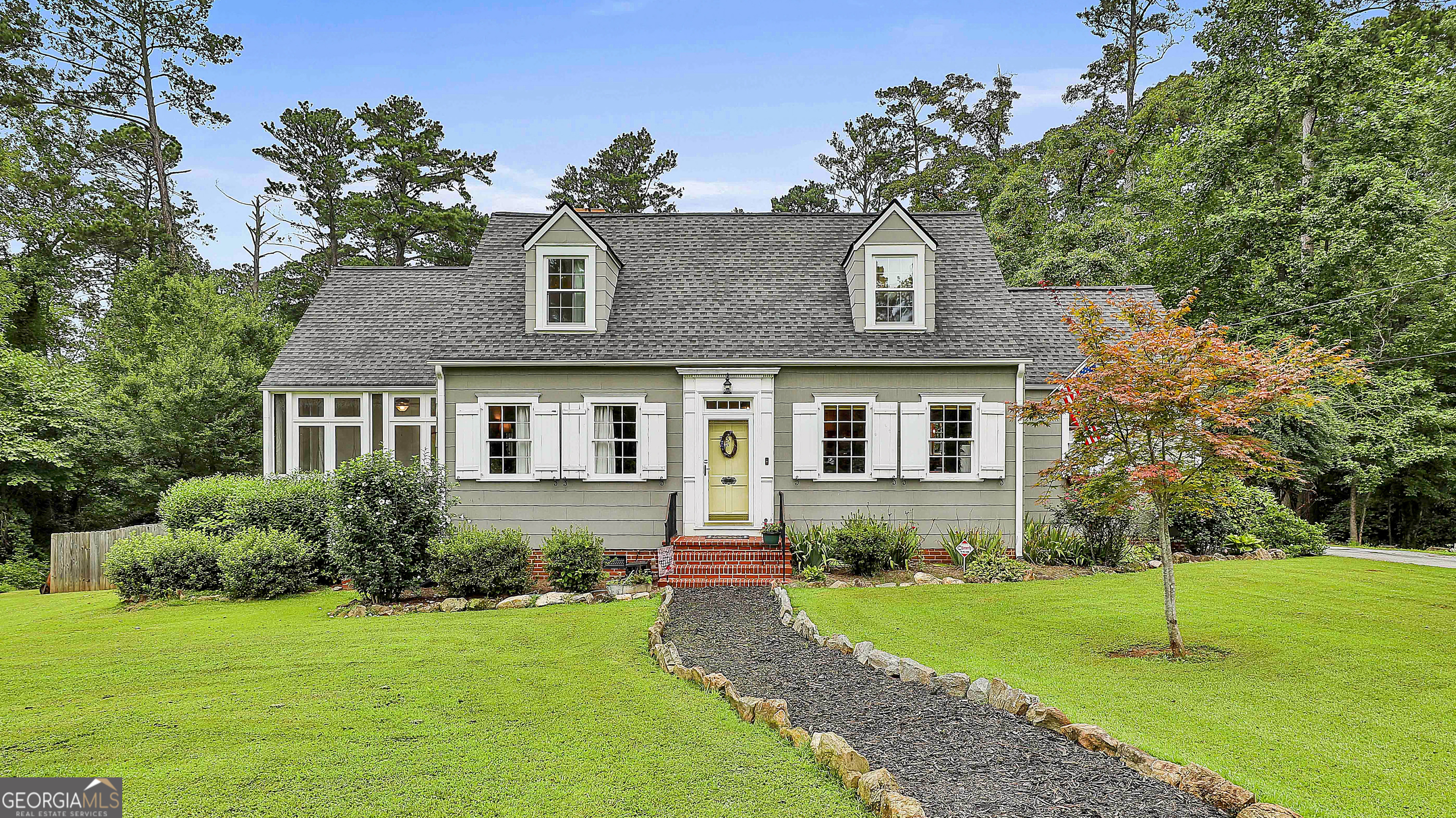 Charming 1937 Bungalow on almost 6 acres inside the City Limits of Fairburn. This Gorgeous home exudes character and it boasts a spacious Living Room, separate Dining Room, 3 bedrooms, Master on main, 2 full baths, 1/2 bath, office/study, Large kitchen, screened porch, separate laundry room, tons of closet space, a floored attic space for plenty of storage, or future expansion, and a 2 car garage with workshop. Owner has the original drawing from the architect who designed the home and the drawings will go with the purchase. Prepare to be Impressed with this ONE OF A KIND property that is located across from Duncan Park!