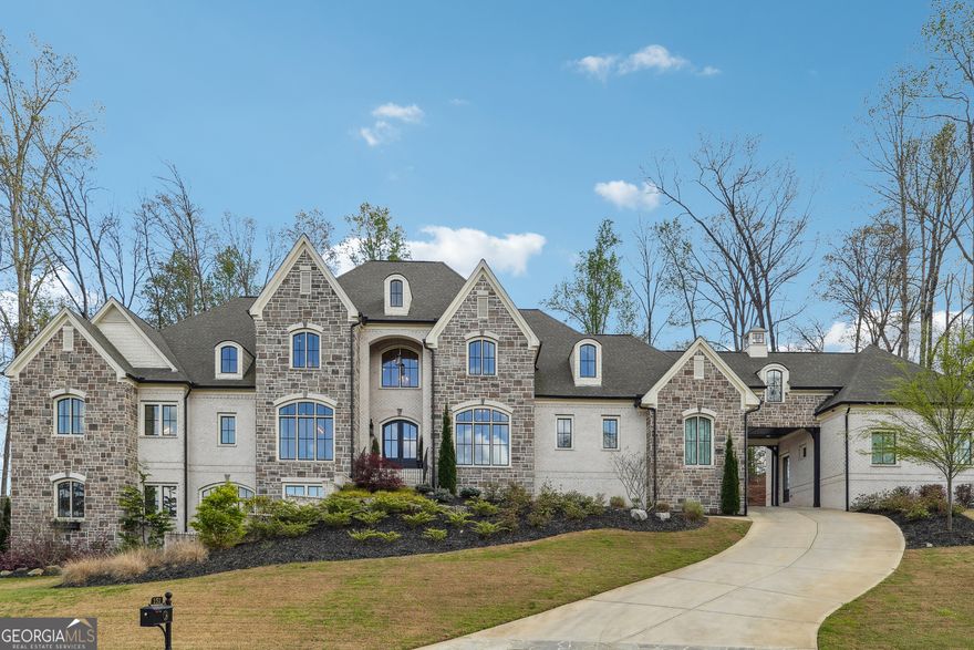Stunning 9,900 sq ft custom estate located in a prestigious gated golf community. This luxury home offers 7 bedrooms, 6 full bathrooms, and 2 half bathrooms, with two primary suites conveniently located on the main level-ideal for multi-generational living or hosting guests. The main-level master suite features spa-like finishes and his & her walk-in closets.  The gourmet kitchen is equipped with high-end Wolf and Sub-Zero appliances, custom cabinetry, and two oversized islands, opening to spacious den perfect for entertaining. A dedicated main-level laundry room adds everyday convenience.  Enjoy your private resort-style backyard featuring a luxury pool and spa, ideal for relaxing or entertaining year-round. The home also includes a 4-car garage with ample storage.  Located within a secure gated golf community offering premier amenities, this exceptional property combines privacy, elegance, and comfort in one of the area's most desirable neighborhoods.