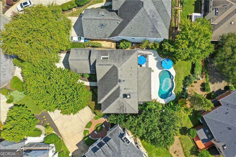 Your EAST COBB RETREAT Awaits in Highly Sought After Chattahoochee Plantation!! BEST SCHOOLS in Cobb!! Open Concept with Wet bar on the Main Level is every Entertainers Dream! Architectural Detail Throughout!! Oversized Windows Provide Beautiful View of Private Pebble Tec Pool!! Renovated Bathrooms Throughout!! Newer Kitchen Appliances! OVERSIZED PRIMARY SUITE & PRIMARY BATH boasts Natural Light from every angle!! Enjoy Grilling on Your Outdoor Deck with Deck System while Watching Guests Have Fun in the Heated Pool!! Private Backyard & Cul-de-sac Lot! Easy Access to Chattahoochee River National Park Trails and Atlanta Country Club!!