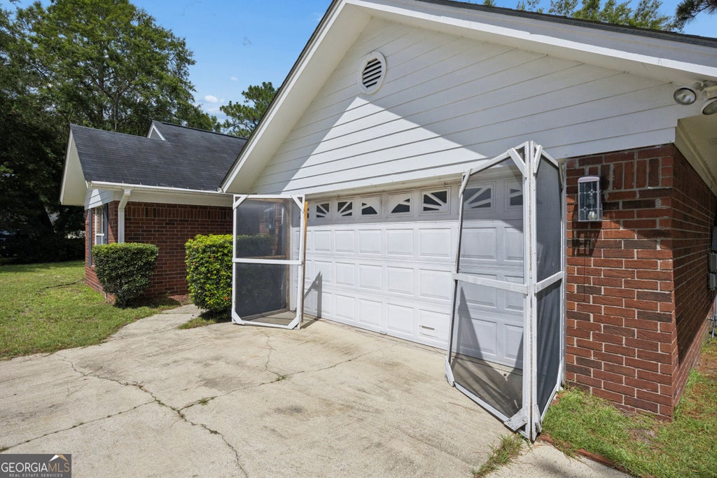 Photo of 940 Hunters Run Road, Hinesville, GA 31313 (MLS # 10846896)
