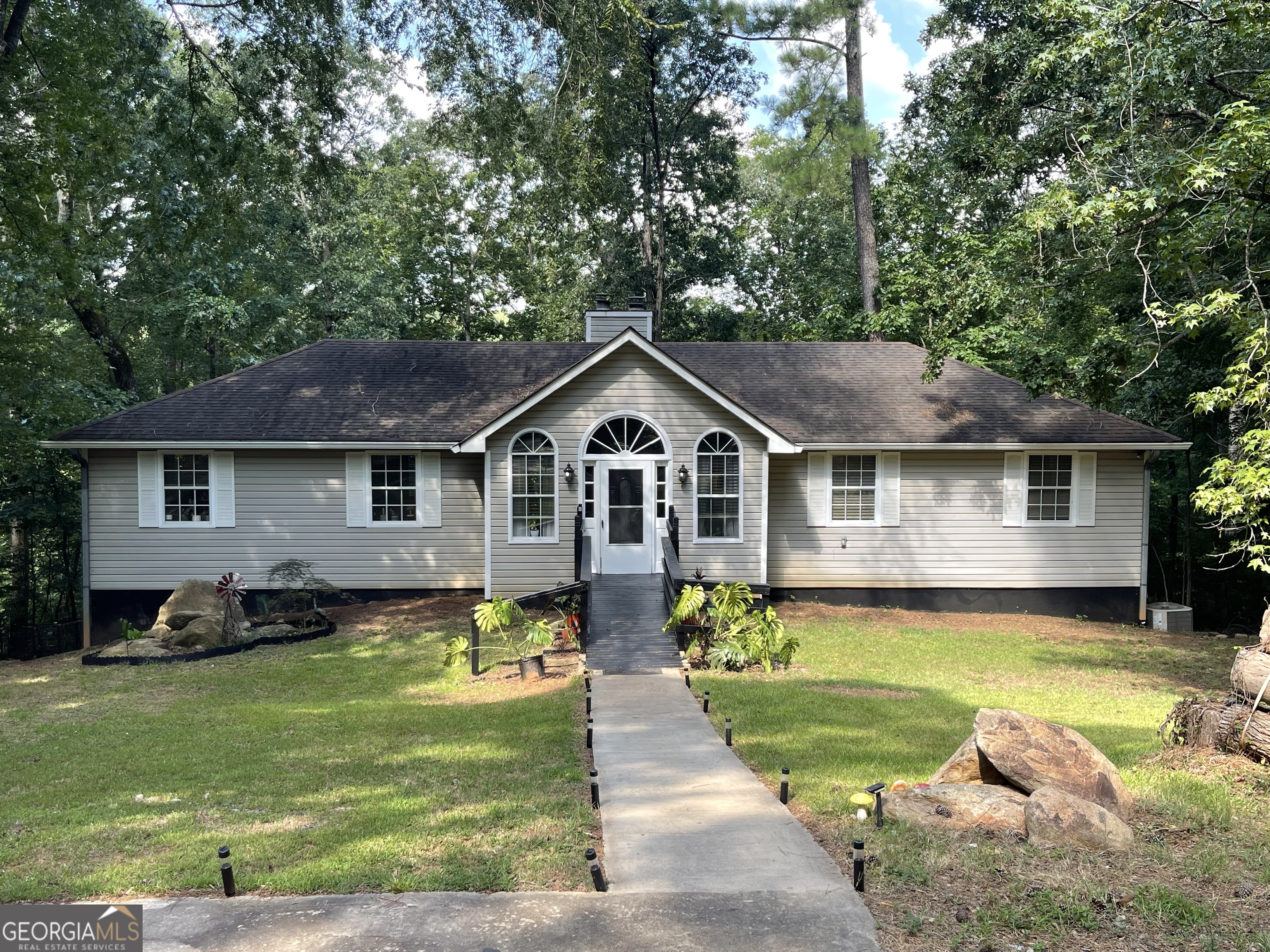 **MOTIVATED SELLER** Nestled in the peaceful lakeside setting of Turtle Cove, this spacious 4-bedroom, 2.5-bath home offers the perfect blend of charm, comfort, and functionality. From its inviting layout to the finished basement, this home offers endless possibilities inside and out. Roomy primary suite on the main level with en-suite bath and walk-in closet. The fully finished basement features three generously sized bedrooms, one and a half bathrooms and family room. Expansive backyard with direct access to the lake for kayaking, fishing, or quiet reflection. Whether you're looking for a year-round retreat or a weekend getaway, this home is a rare opportunity. This vibrant lake community blends recreation and relaxation with top-tier amenities, including a golf course, swimming pool, sandy beaches, boat ramp, tennis courts, a clubhouse, and a restaurant-all designed for everyday enjoyment and effortless living. Welcome home! Up to $1500 lender credit with preferred lender.