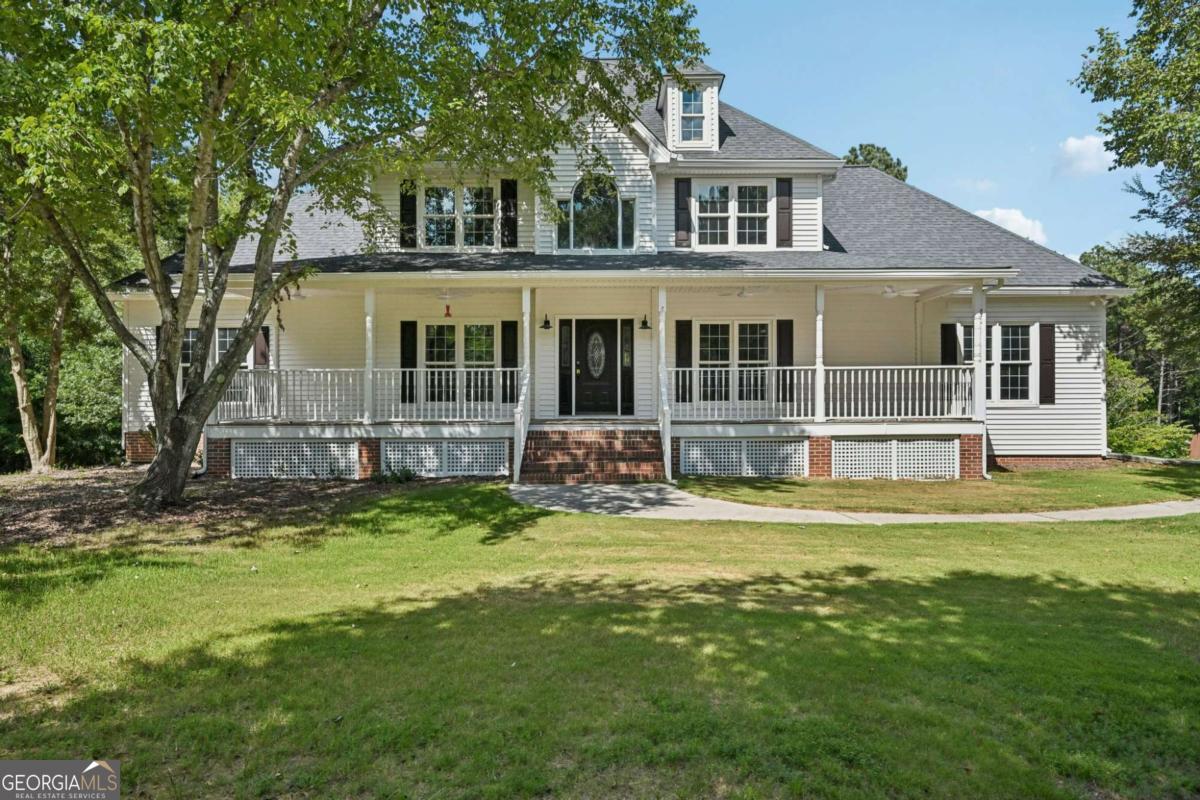 Welcome to your own private retreat! Nestled on over 4 acres, this newly remodeled estate offers both luxury and comfort-- complete with your own secluded walking trail. A brand-new driveway enhances the curb appeal, welcoming you home! Inside, fresh paint throughout the home gives a bright, modern feel along with many other upgrades. The updated kitchen with quartz countertops is truly a dream, perfect for hosting gatherings and creating memories. Whether you're entertaining or enjoying a quiet evening, this home blends upscale finishes with the warmth and charm of everyday living. A partially finished basement also gives you an opportunity to put your own touch on this home. Don't miss the chance to own this serene and stylish property-- it's the perfect place to call home.