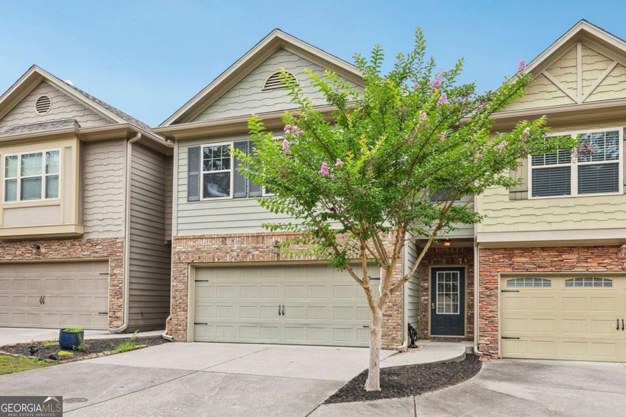 Listed by Mano Sells Homes: Tucked into the sought-after Sunset Pointe neighborhood of Woodstock, this townhome is the perfect blend of comfort, style, and location. Inside, the open floorplan creates an airy, inviting space that's ideal for entertaining or simply enjoying everyday life. The living room centers around a charming fireplace-adding warmth and character to your main gathering area.   Upstairs, you'll find three generously sized bedrooms, including an oversized master suite that truly impresses. All new carpet installed in May 2025 and LVP flooring . With room for a sitting area, dual walk-in closets, and a spacious ensuite bath featuring a soaking tub, it's a personal retreat you'll love coming back to.    Step outside to a private, fenced-in backyard with a patio-perfect for grilling out, relaxing, or hosting friends on sunny afternoons.    Love the lake life? This home is just minutes from Lake Allatoona with easy access to nearby marinas for all your lakeside adventures. Convenient to shopping, dining, schools, and entertainment-this one checks all the boxes. Schedule your showing today and come see what makes this home so special!