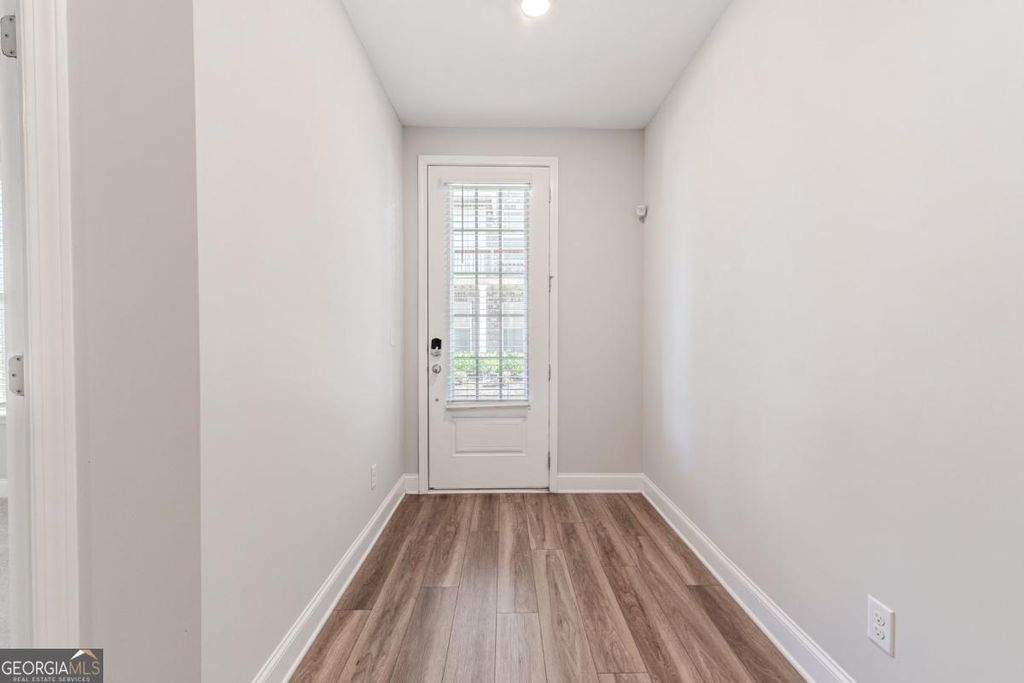 Photo of 5051 Pinckney Lane, Peachtree Corners, GA 30092 (MLS # 10710744)