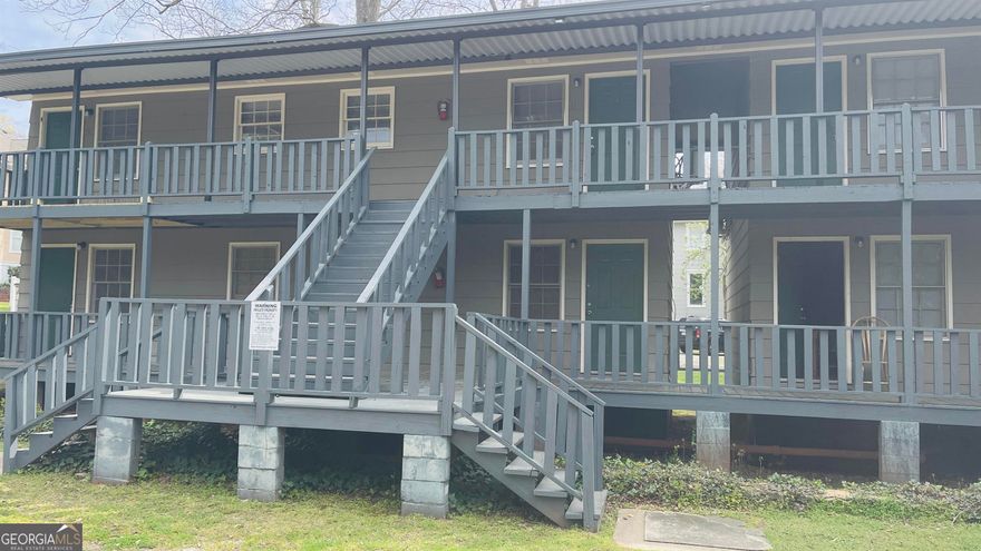 Will not last! Great Intown Location! Located on Corner of Ben Hill and West Haralson Street with frontage on Broad Street. Studio apartment with kitchen, bed and bath, hardwood flooring, parking pad, laundry onsite, must see!