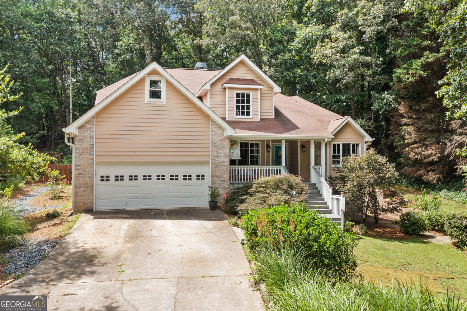 Rare Opportunity in Geneva Woods - South Forsyth High School District! Tucked away on a quiet street in the coveted Geneva Woods community, this beautifully maintained home sits on nearly an acre of private, wooded property -a serene retreat with the convenience of Forsyth County living. Homes in this neighborhood seldom hit the market, and this one is truly exceptional. With 4 spacious bedrooms, a bonus room upstairs, 2.5 bathrooms, and over 3,200 square feet, this home offers generous space, comfort, and flexibility for today's lifestyle. The primary suite is ideally located on the main level, while the upper level features all-new hardwood flooring and bright, airy secondary bedrooms. At the heart of the home, a light-filled two-story living room with a double-sided fireplace leads into a bright and open eat in kitchen. Step outside to the updated back deck with a brand-new wood pergola, and enjoy peaceful mornings or evenings in your fenced backyard oasis, complete with lush landscaping, gravel walkways, a fire pit with custom path, and blueberry, raspberry, and rose bushes. Additional highlights include a laundry/mudroom conveniently located off the garage and a finished walk-out basement offering multiple flex spaces-ideal for a media room, home gym, playroom, or studio. With its own private exterior entrance, the basement offers excellent potential to add a full kitchen and bathroom, creating an independent living space or in-law suite. Recent updates include: new hardwoods upstairs, new carpet in the basement, new upstairs furnace new refrigerator, paint, new gutter system, and enhanced landscaping and hardscaping. Enjoy swim and tennis amenities in Geneva Woods, plus a location that's just minutes to GA-400, Lake Lanier, Northside Forsyth Hospital, Costco, Target, restaurants, parks, and top-rated schools. This is your chance to own a rare gem in one of Forsyth County's most desirable communities.