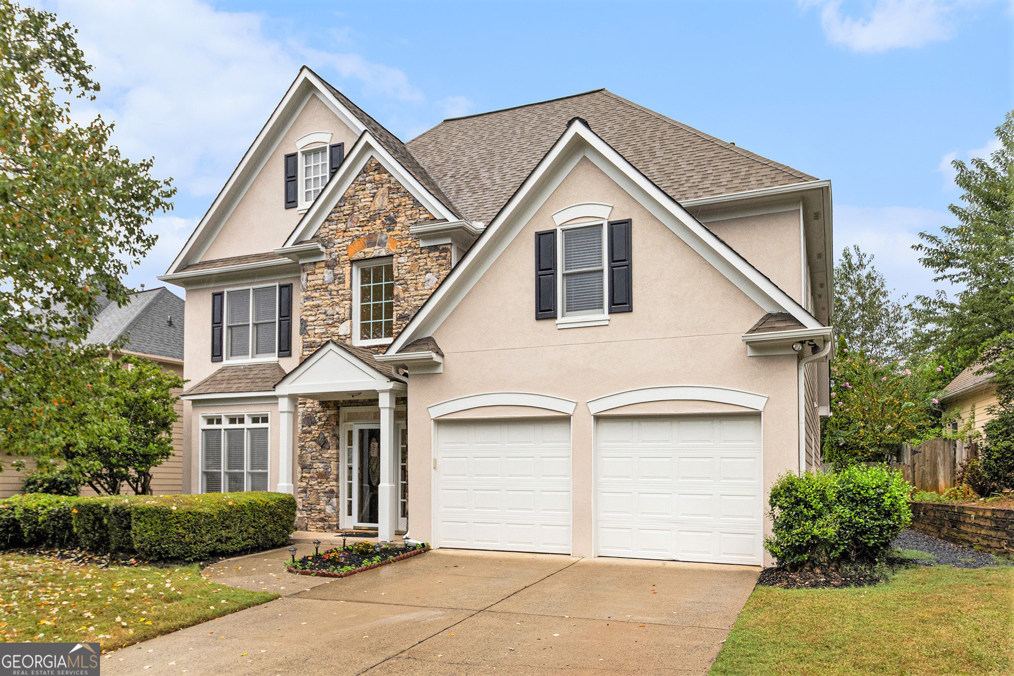 Located in the heart of East Cobb, this beautifully maintained home combines comfort, space, and convenience. With 4 bedrooms and 2.5 bathrooms, it features a functional layout that includes a spacious kitchen, a cozy fireside family room, and a private backyard ideal for entertaining. Freshly painted inside and out, this home is move-in ready with room for your personal touches. Tucked away in a quiet neighborhood, you'll enjoy top-rated schools and quick access to major highways, shopping, parks, Braves Stadium, Kennesaw State University, and more-perfect for modern lifestyles. Highlights include a new interior & exterior paint, new flooring, water heater, and a new washer and dryer (included). Community amenities include swimming, tennis, and a playground. This is a must-see for buyers who value quality, location, and comfort.