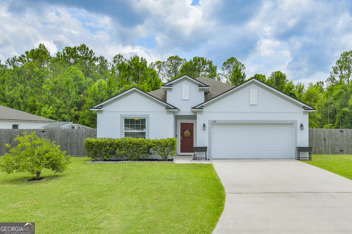 Immaculate, spacious, convenient, & move-in-ready! This 4 bedroom 2 bath homes offers plenty of room to spread out with nearly 2200 sq ft. The easy maintenance stucco exterior will leave you with more free time for chickens! Yes, did you see the grand 7.8' x 10.8' x 17.25' coop?! Easy to clean at wheelbarrow height! The back yard is fully fenced for privacy with a covered porch for relaxing. The front entry will greet you with a formal foyer, followed by tile floors in the main living areas, nearly new carpet in the bedrooms (installed December 2024), an expansive kitchen with a breakfast bar island, pantry, an open layout to dining & living areas, indoor laundry room, & more! The master retreat boasts a sizable room with a walk-in closet, double vanity, separate shower, and soaking tub. This home is already setup for ADT security as well as Reolink cameras & doorbell (will convey). Located in Lake Manor South and only a short walk to schools, Camden PSA, even Chick-fil-A! Easy to show or see. Call to schedule your appointment today.