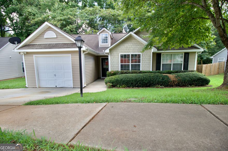 Welcome to this beautifully updated open-concept ranch home, offering 3 spacious bedrooms and 2 full bathrooms. The inviting floor plan provides a seamless flow from the living areas to the family room, making it ideal for both entertaining and everyday living. Step inside to discover fresh paint and new LVP floors throughout, adding a contemporary and low-maintenance touch to the space. The family room, visible from the kitchen, serves as the heart of the home, fostering a warm and connected atmosphere. This charming home is not only move-in ready but also offers additional conveniences, including a 1-car garage with an extra parking pad and a gas water heater for energy efficiency and a reliable hot water supply. Located just minutes from shopping, restaurants, and parks, it provides the perfect blend of comfort and convenience. Moreover, the house is very close to Reeves Creek Trail, which is right behind the property in the woods, leading directly to Memorial Park. Don't miss the chance to make this your new home!