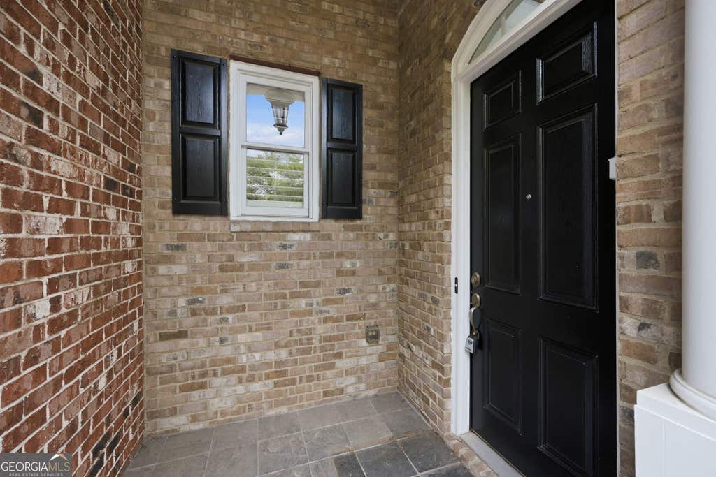 Photo of 5806 Riverstone Circle #10, Atlanta, GA 30339 (MLS # 10821232)