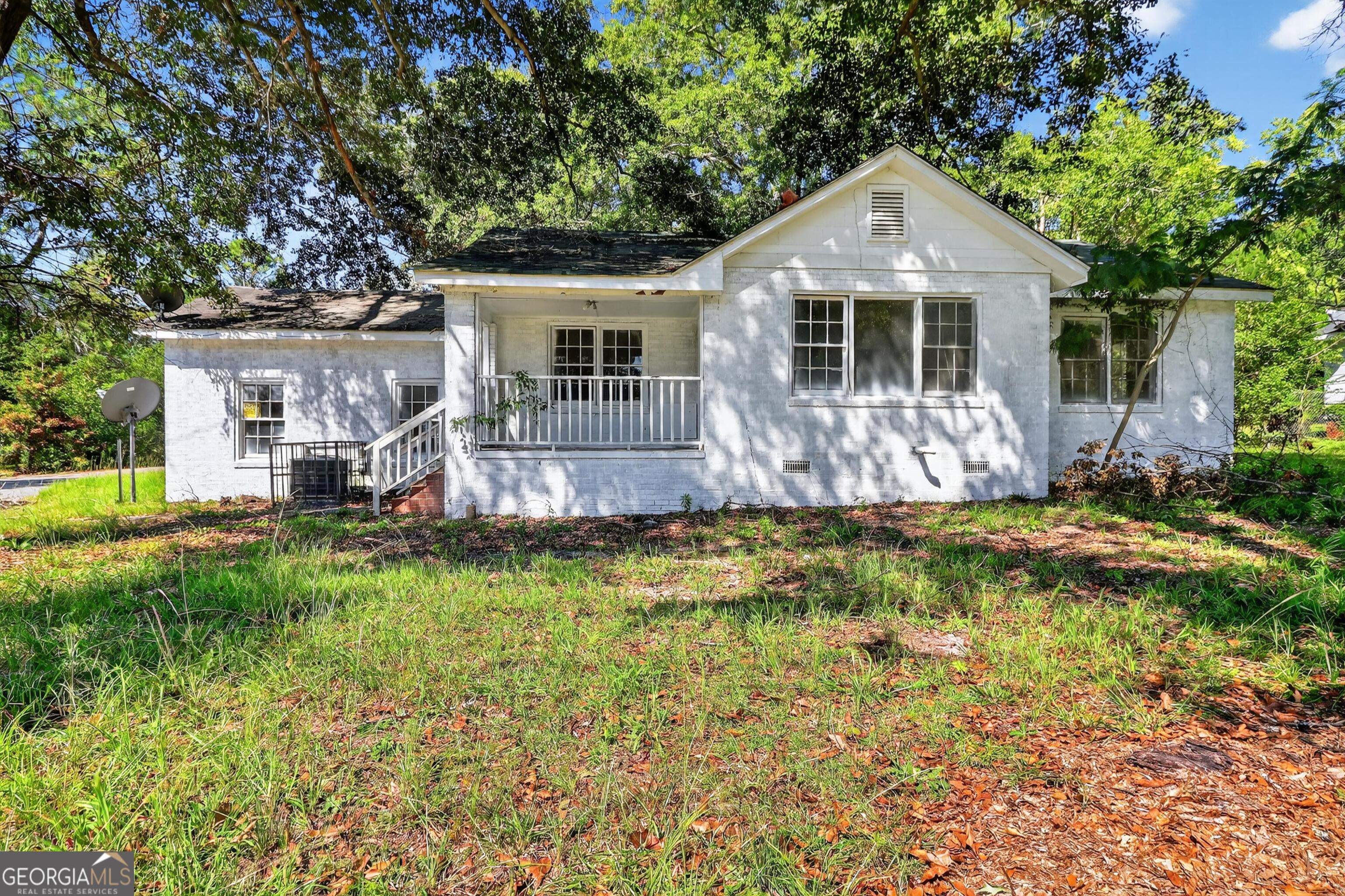 Discover a rare investment opportunity or a great multi-generational living setup with this beautifully remodeled dual-property listing on a single lot in Macon! The main home offers spacious living with 4 bedrooms and 2 full bathrooms, while the second home features a comfortable 2-bedroom, 1-bath layout - ideal for extended family, guests, or rental income. Both homes have been thoughtfully updated with: New roofs, updated electrical and plumbing systems, and stylish interior finishes including updated kitchens, bathrooms, flooring, and lighting Whether you're looking to live in one unit and rent the other, expand your investment portfolio, or provide housing for multiple generations, this versatile property checks all the boxes. Don't miss out!