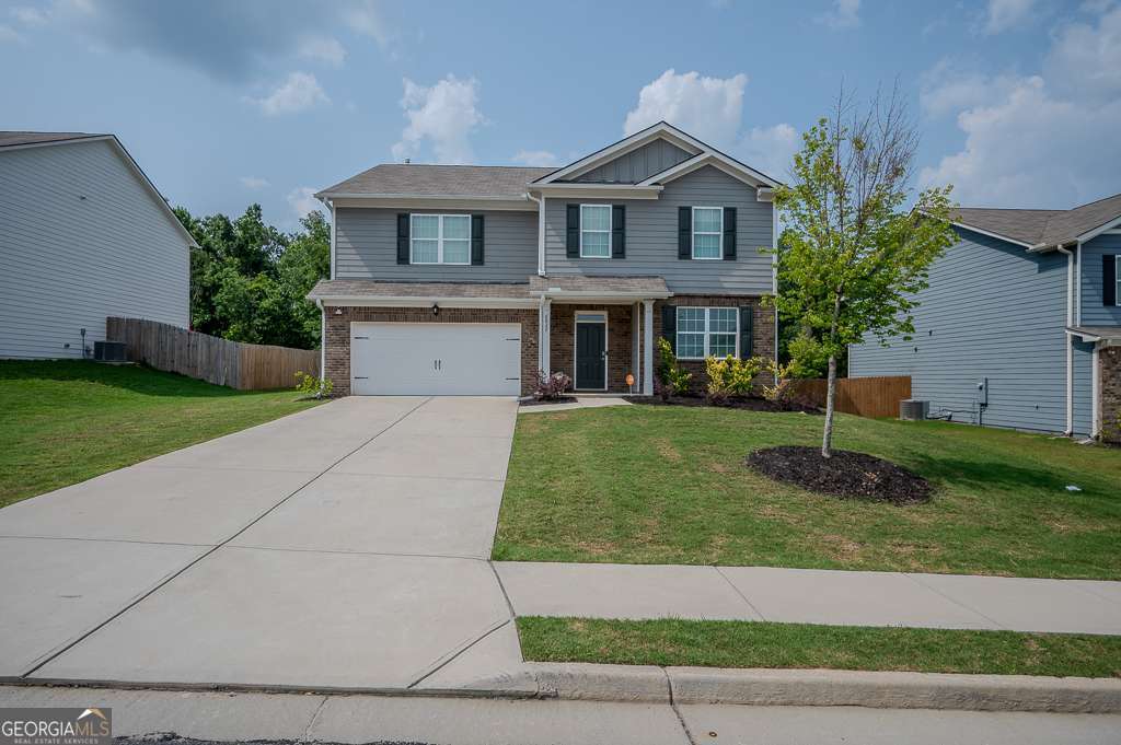 Welcome to 6827 Chataran Drive, a beautifully maintained home nestled in Glen At Kensington S/D Lithia Springs GA! This spacious residence offers the perfect blend of comfort and convenience, featuring 5 bedrooms,3 Full bathrooms, With One Bedroom on the main next to full bathroom and a flexible floor plan ideal for today's lifestyle. Enjoy a bright and airy living room , A separate dining area, and a well-appointed kitchen with ample cabinet space and a cozy eat in breakfast Area. The oversized owner's suite boasts a private bath and Two generous closet spaces. Outside, relax on the back patio overlooking a level yard-perfect for entertaining or quiet evenings. Located in a quiet, established neighborhood with HOA and easy access to I-20, Sweetwater Creek State Park, shopping, dining, and more. Don't miss this move-in ready gem-schedule your tour today! Up to $23,750 in Down Payment assistance available to qualified Homebuyers through Preferred Lender!