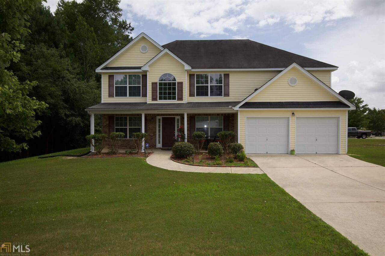 Lovely 4 bedroom home with 3 full bathrooms which include a guest bedroom on the main floor. Upstairs loft area, separate formal living & dining room, and fireplace in the family room. Kitchen with island overlooking the sunken family room. Large master bedroom with trey ceilings, and separate sitting area. Spacious laundry room located on second level. The exterior provides a porch and patio all situated on a large corner lot.