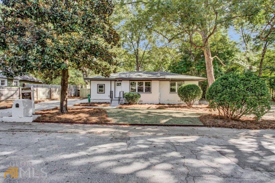 Welcome home to this gorgeous, fully renovated home situated on a beautiful, tree-lined street in the heart of Lithonia. Enjoy an open-concept floor plan with light-filled family room overlooking the dining area and the amazing kitchen. Premium soft close cabinets are complemented by trendy honey-comb backsplash and white-quartz counter tops. A full new set of stainless steel appliances and new faucet complete the beautiful kitchen look. You will also love the modern waterproof LVP flooring throughout and the stylish all new bathrooms with porcelain tile and frameless shower. Apart from 3 beds and 2 baths the home also offers a flex space / mud room/ office/ gym. Enjoy a peace of mind with quality, permitted work, updated electric, new plumbing, new HVAC, new roof, newer windows and insulation. Last, but not least a large, fenced, flat yard with privacy fence in the front. Take advantage of this excellent location with fast access to I-20, and minutes from Mall at Stonecrest, New Black Wall Street Market, grocery stores, and restaurants. Only 20 miles to Atlanta & the Airport.