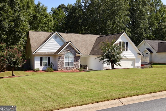 Step into this charming home that combines comfort, space, and style. As you enter the inviting gallery foyer you'll discover a flowing living room with vaulted ceilings and a cozy stone fireplace. The kitchen offers abundant countertop space, plenty of cabinets and stainless steel appliances. The primary suite is conveniently located on the main and features a full bath that includes a garden tub, separate shower, and a large walk-in closet. Upstairs offers an extra bedroom along with a versatile den/office space. Outdoor living is a highlight with a large deck that's perfect for grilling, entertaining, or simply enjoying morning coffee overlooking the expansive fenced in backyard. The outbuilding provides extra storage or a workshop space. Need room for RV parking- you'll have space for that here. The double car garage is fitted with a roll-up garage door screen. A home designed for comfort and is move-in-ready. Schedule a showing today.