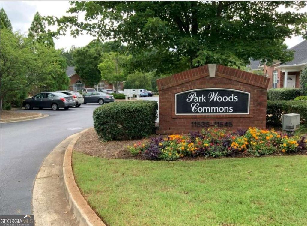 Photo of 11535 Park Woods Circle #E, Alpharetta, GA 30005 (MLS # 10737034)