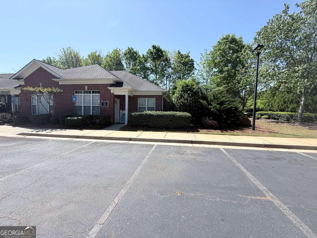 Photo of 11535 Park Woods Circle #E, Alpharetta, GA 30005 (MLS # 10737034)