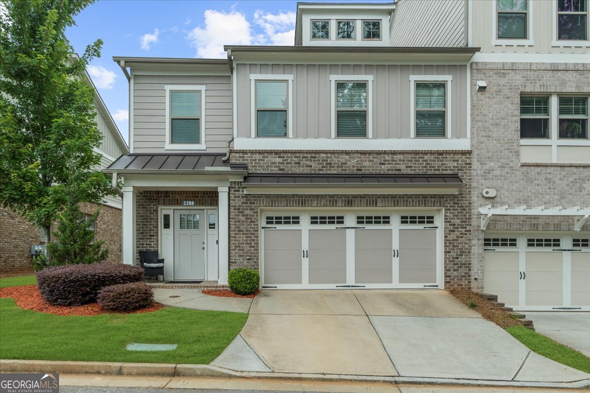Spacious East Cobb End-Unit Townhome - 3 Bed / 3.5 Bath This beautifully maintained 3-bedroom, 3.5-bath end-unit townhome offers the ideal blend of comfort, functionality, and modern design. Inside, you'll find a bright and open layout filled with natural light, perfect for everyday living and entertaining. The kitchen features a gas cooktop, Whirlpool appliances, and an oversized island overlooking the fireside family room - complete with custom built-ins for added style and storage. Upstairs, each bedroom includes its own en-suite bath. The luxurious primary suite offers a sitting area, spa-inspired bathroom with soaking tub and separate shower, double vanity, and two walk-in closets. Laundry is conveniently located on the bedroom level for added ease. Additional features include a double car garage and a fenced backyard with an expanded concrete patio - a perfect spot to unwind or host outdoors. The HOA covers roof maintenance, termite protection, and exterior upkeep, allowing for truly easy living. Located just minutes from I-75, Marietta Square, shopping, dining, and local parks, this move-in-ready townhome combines style and convenience in a prime East Cobb location. Schedule your private tour today!