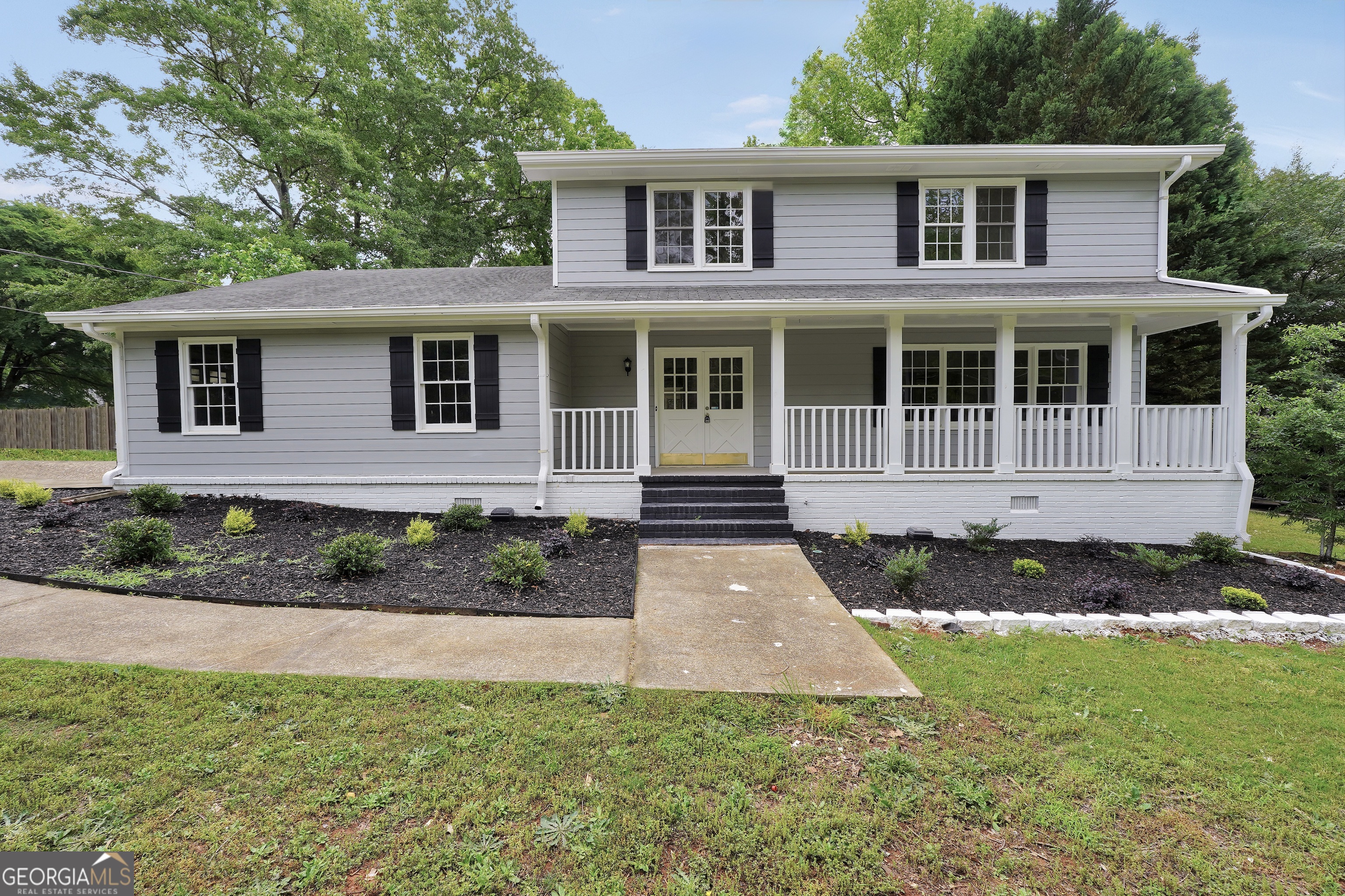 Welcome! This beautifully renovated traditional home sits on a spacious corner lot in a quiet neighborhood. Inside, you'll find 4 bedrooms and 2 full bathrooms upstairs, plus a convenient half bathroom downstairs. The layout is classic and functional, with a cozy sunroom perfect for relaxing or entertaining. The entire home has been updated with brand new windows and appliances - move-in ready with modern upgrades throughout. Roof is 5 years old and has a brand new water heater. Check it out for yourself!