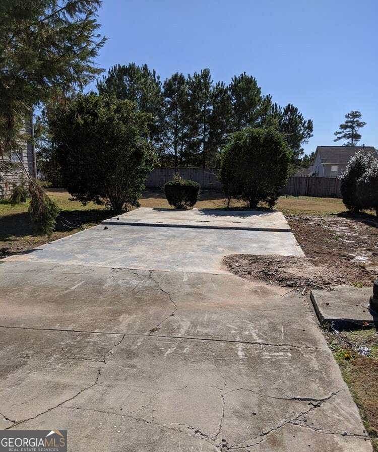 Photo of 872 Shoals Court, Atlanta, GA 30349 (MLS # 10822324)