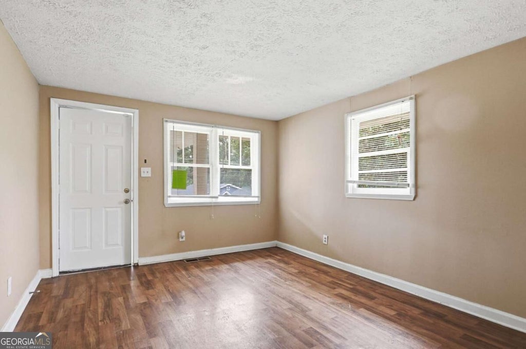Photo of 620 Gibbons Drive, Scottdale, GA 30079 (MLS # 10839615)