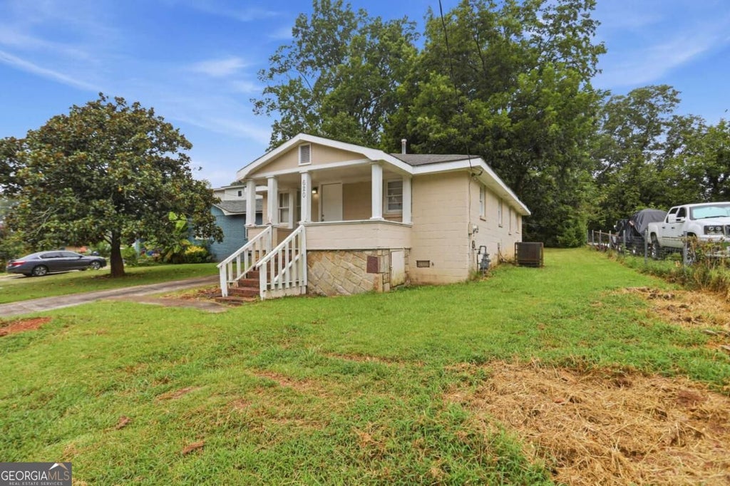 Photo of 620 Gibbons Drive, Scottdale, GA 30079 (MLS # 10839615)