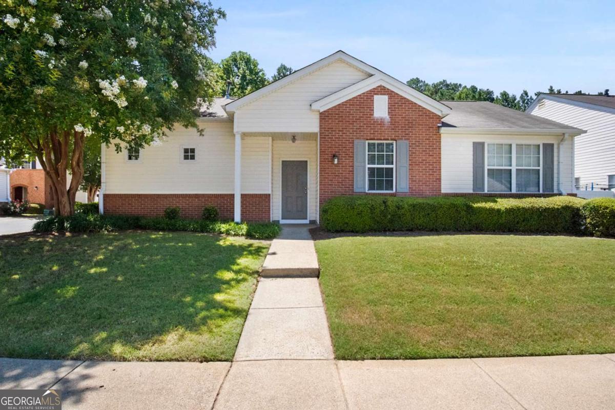 Renovated Ranch in Prime Location - One-Level Living! Welcome to this beautifully updated 3-bedroom, 2-bath ranch-style home, perfectly situated near I-75, top-rated schools, shopping, and just minutes from downtown Acworth. This charming home offers comfortable one-level living with thoughtful updates throughout. Step inside to find new carpet and fresh paint, complemented by updated flooring that adds a modern touch. The kitchen has been fully renovated with brand new cabinets, sleek countertops, a stylish farmhouse sink, and the refrigerator is included-making this home move-in ready. Both bathrooms feature new granite countertops and updated lighting, while the dining area also boasts a new modern light fixture. Enjoy the outdoors in your fenced-in backyard, perfect for pets or entertaining, and benefit from a 2-car garage for ample storage. Located in a gorgeous, well-maintained community with wide streets and yard maintenance included, this home blends comfort and convenience in a truly unbeatable location. Don't miss your chance to own this updated gem in a sought-after neighborhood!