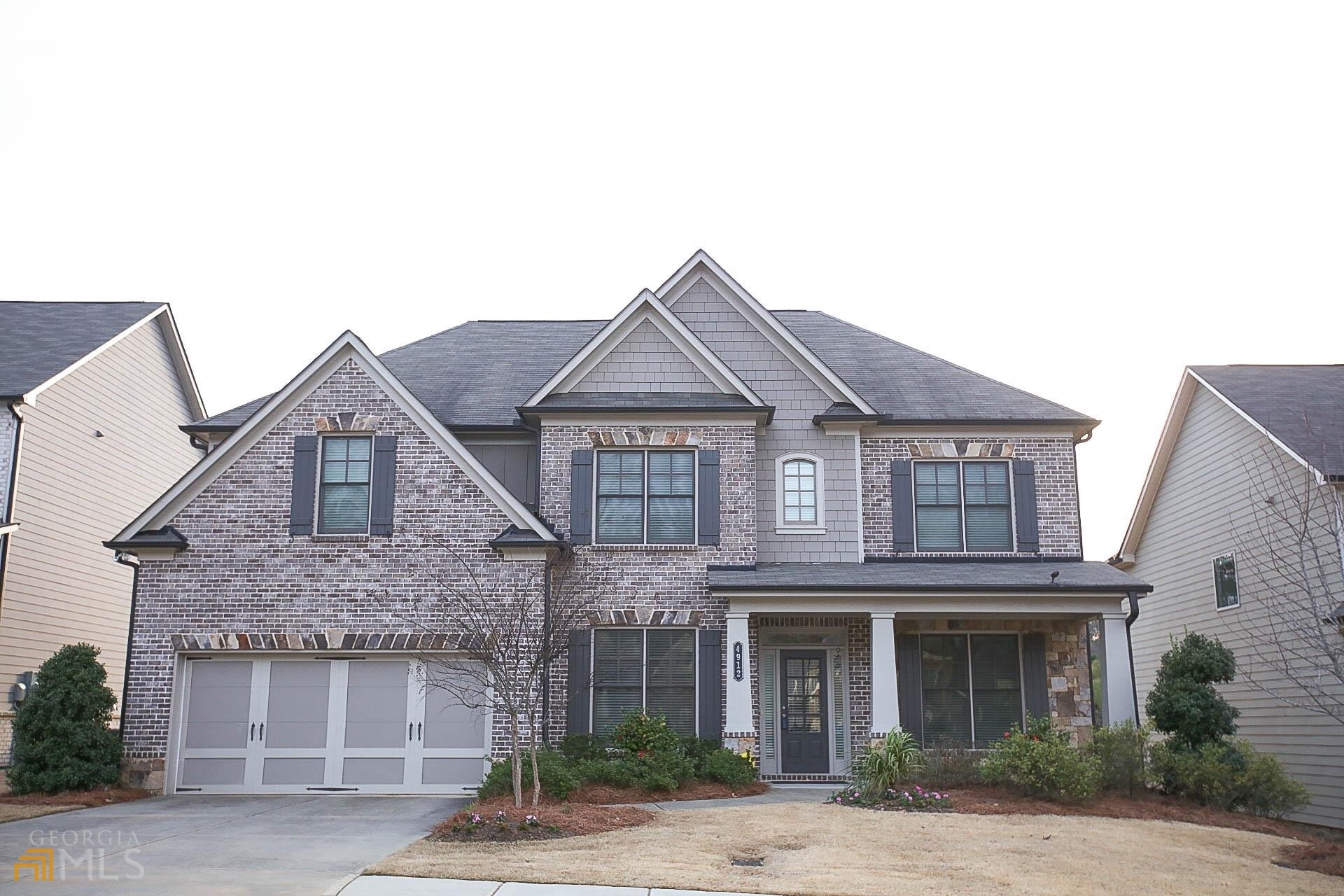 Stunning, Open Floorplan and an entertainer's dream! Former Model home with all the bells and whistles and too many upgrades to list them all!! All Hardwood Floors throughout Main floor. Gourmet chef's Kitchen with lots of natural light, stainless steel appliances, granite counters, tile backsplash & Spacious walk-in pantry. Kitchen overlooks Large Family Room with built-in bookcases & coffered ceilings. Guest Suite w/full bath on Main. Separate Formal Living & Dinning Rooms. Oversized Master Suite upstairs w/tile bathroom & Huge walk-in closet. 3 generous sized secondary bedrooms & 3 bathrooms also on 2nd level. 2nd level is finished off with a Media Room the whole family will love! Covered outside patio with stone fireplace. Great School District!