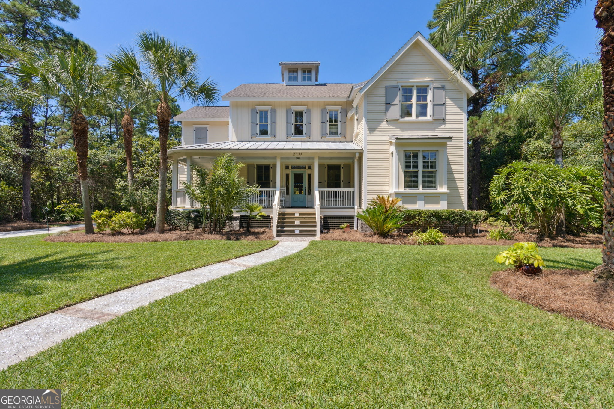 EXPANSIVE, WARM & INVITING BEST DESCRIBES THIS TRADITIONAL STYLE TWO STORY HOME. THE MAIN HOME HAS 5 BEAUTIFUL BEDROOMS AND 4 BATHS. A GUEST SUITE IS LOCATED OVER THE THREE CAR GARAGE. THIS HOME WITH A CONTEMPORARY FLAIR ON A QUIET CUL DE SAC LOT IN THE GATED COMMUNITY OF CUMBERLAND HARBOUR CAN MAKE YOUR DREAM COME TRUE. A LOVELY HOME WITH A PRIVATE LUSH BACK YARD AND A EXPANSIVE SIZE SCREENED PORCH TO ENJOY THE PEACE & QUIET & YOUR BEAUTIFUL BACK YARD. In addition there is a large finished space above the garage with a full bath that can be a guest suite or an office space. THE TWO STORY FOYER DRAWS YOUR EYE TO THE SECOND LEVEL WHERE YOU SEE THE ACCENTS ON THE STAIRWAY THAT TEND TO BE CONTEMPORARY. This gracious home built by Don Roberson has Australian pine flooring in the main living areas and "like new carpet" in the bedrooms. Adjacent the living area is a beautiful spacious kitchen featuring a like new gas cooktop on a large center island. The island contains ample built in custom cabinetry. Wall cabinets surround the kitchen providing abundant storage. In addition to the gas cooktop, the kitchen also features an electric cooktop. A wet bar with a built in ice machine is nestled in cabinetry near the living area. A gas fireplace, solid wood beams on the ceiling, and built in bookcases in the great room, along with several niches are just a few more of the special features this listing offers. In addition the main suite has a vaulted ceiling and built in bookcases. Two closets, a walk in shower and double sinks with granite counter tops help make a luxurious main oasis.