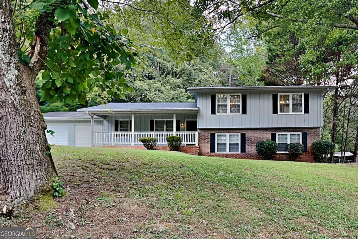 Welcome to 103 Stone Mill Ln NW, a beautiful single-family home located in Marietta, GA. This charming residence offers: * Approximately 2,360 square feet of living space * 5 bedrooms and 2.5 bathrooms * Updated kitchen with granite countertops and stainless steel appliances * Cozy fireplace in family room * Finished basement with additional living space and bedrooms * Attached 2-car garage * Private backyard with deck for outdoor relaxation * Convenient access to shopping, dining, and recreation Don't miss this opportunity to make this lovely property your new home! Schedule a showing today to experience the comfort and charm of 103 Stone Mill Ln NW.