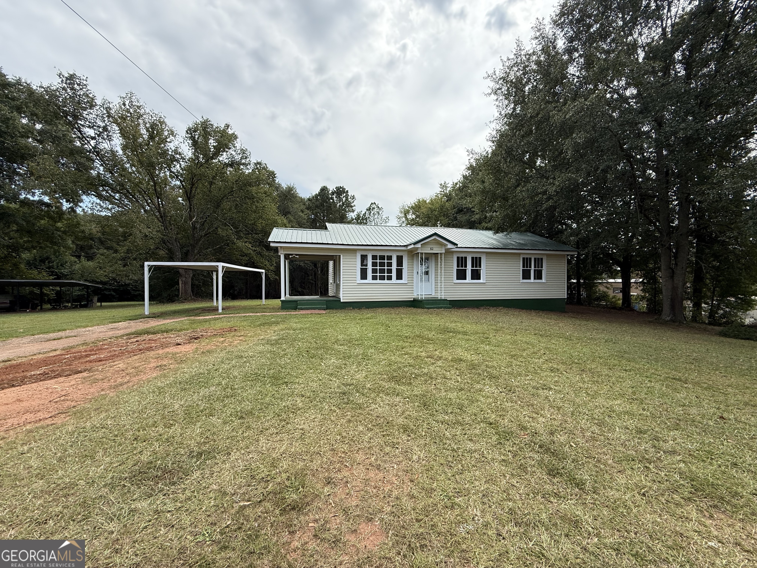 Discover your pathway to homeownership with this charming cottage-style gem that proves you don't need to break the bank to secure your future. This recently updated two-bedroom, one-bathroom home offers the perfect blend of comfort and practicality, making it an ideal choice for first-time buyers or anyone seeking exceptional value in today's market. Step inside to find thoughtfully updated interiors that showcase the home's cottage character while providing modern conveniences. The two well-appointed bedrooms offer comfortable retreats, while the updated bathroom features contemporary fixtures and finishes.The layout maximizes every square foot, creating a welcoming atmosphere throughout. The real treasure lies in the expansive outdoor space, perfect for morning coffee, weekend barbecues, or simply unwinding after a long day. Whether you're dreaming of a garden oasis or entertaining friends and family, this generous yard provides endless possibilities for outdoor enjoyment. Convenience is key with dedicated parking that eliminates the daily hunt for a spot. The location puts you within easy reach of shopping, dining, schools, and major transportation routes, making daily errands and commuting a breeze. This property represents unprecedented value in today's competitive market, offering the rare opportunity to build equity instead of paying rent. The recent updates mean you can move in and start enjoying homeownership immediately, without the stress and expense of major renovations. Don't let this opportunity slip away. Your future self will thank you for making the smart choice to invest in property ownership today. Call Your Favorite Realtor Today to Learn More!
