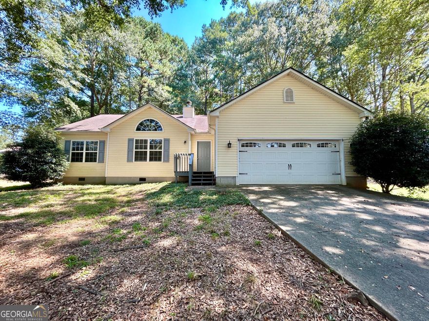 Featuring 3 bedroom / 2 baths ranch home nestled on .70 acres. Step inside to the inviting foyer. Split bedroom plan with hardwoods throughout. The kitchen boasts stainless steel appliances, an island, dining room and view to the cozy fireside family room. The master suite leads into the spacious ensuite master bathroom featuring his and her closets and a garden tub! Kids and pets will love the large fenced-in backyard. The back deck is perfect for entertaining. NO HOA.
