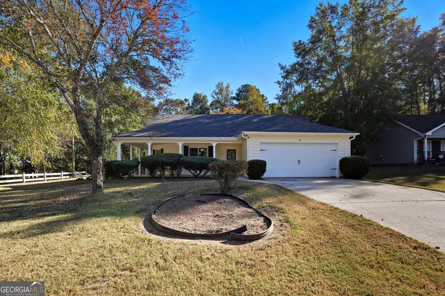 Spacious 3-Bedroom Home on Corner Lot - No HOA!    Welcome to this charming and spacious home featuring a covered wrap-around front porch-perfect for relaxing or entertaining.     Inside, you'll find a completely renovated ranch home with an open concept. New flooring throughout.  The primary suite includes a double tray ceiling, a luxurious bathroom with a double-sink vanity, soaking tub, and separate shower. Two additional bedrooms share a well-appointed guest bathroom.  Step outside to a deck overlooking a private backyard, ideal for outdoor gatherings or quiet evenings.