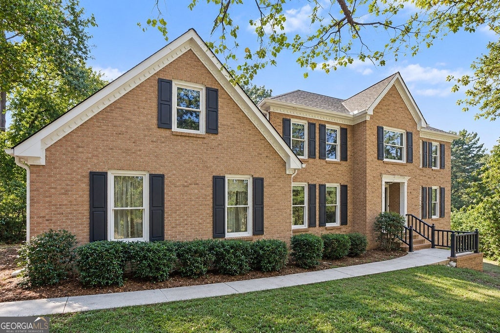 Photo of 4857 Castlewood Drive SW, Lilburn, GA 30047 (MLS # 10872779)