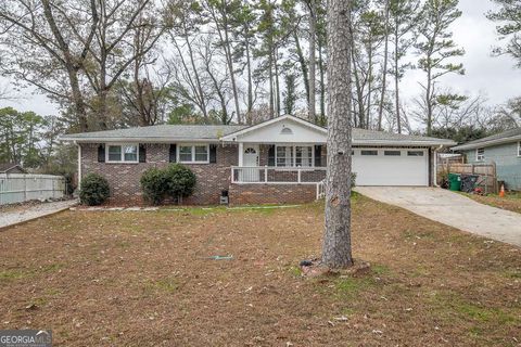 Photo of 4495 Casco Lane NW, Lilburn, GA 30047 (MLS # 10657464)