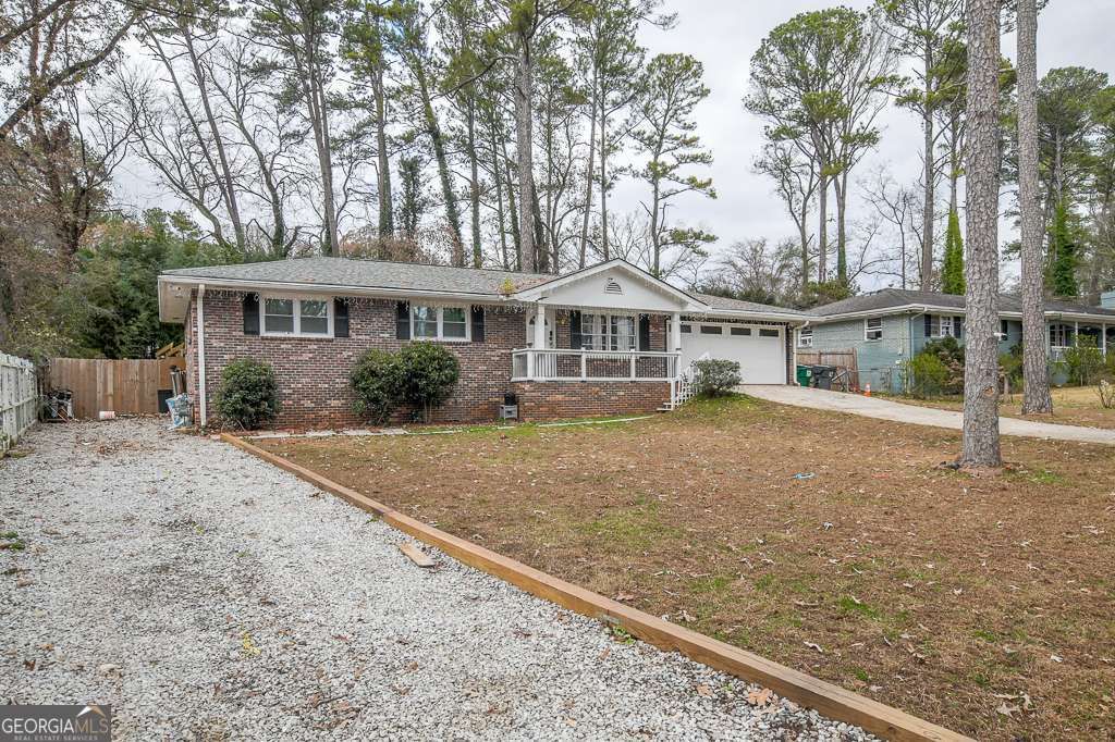 Photo of 4495 Casco Lane NW, Lilburn, GA 30047 (MLS # 10657464)