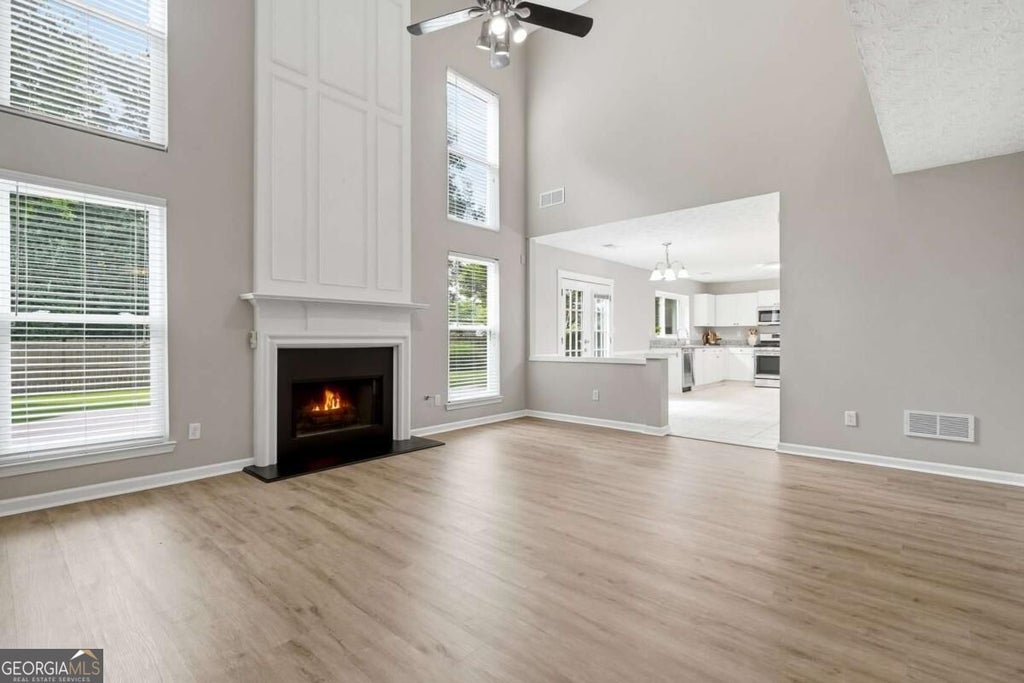 Photo of 3855 Oak Park Drive, Suwanee, GA 30024 (MLS # 10873707)