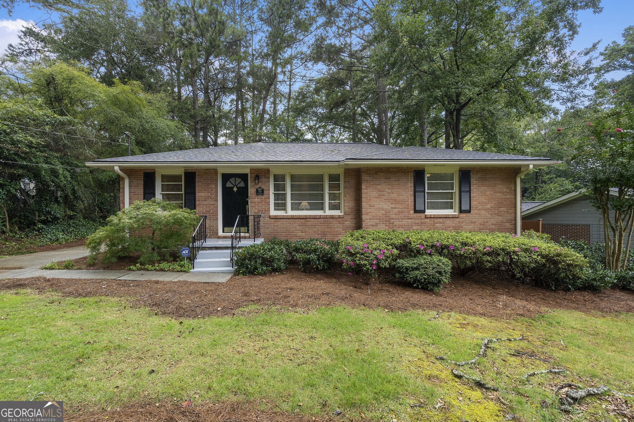 Stop right here for the most adorable mid-century ranch in sought after Medlock Park! This light-filled, all brick home with gleaming hardwoods nestled on a quiet street is in the heart of North Decatur. Tasteful updates throughout, this home has been meticulously maintained with spacious rooms and great functional flow. Light and bright kitchen has a gas range, stylish touches, and open to a cute sunroom that opens up to the gorgeous backyard. Complete with a great deck open to the big walkout backyard with shed, this home is perfect for entertaining guests! Near all Decatur has to offer, including lush parks and top rated dining, in the best neighborhood with an award-winning school district, this one is a keeper! To make this home even better, it boasts a BRAND NEW roof!