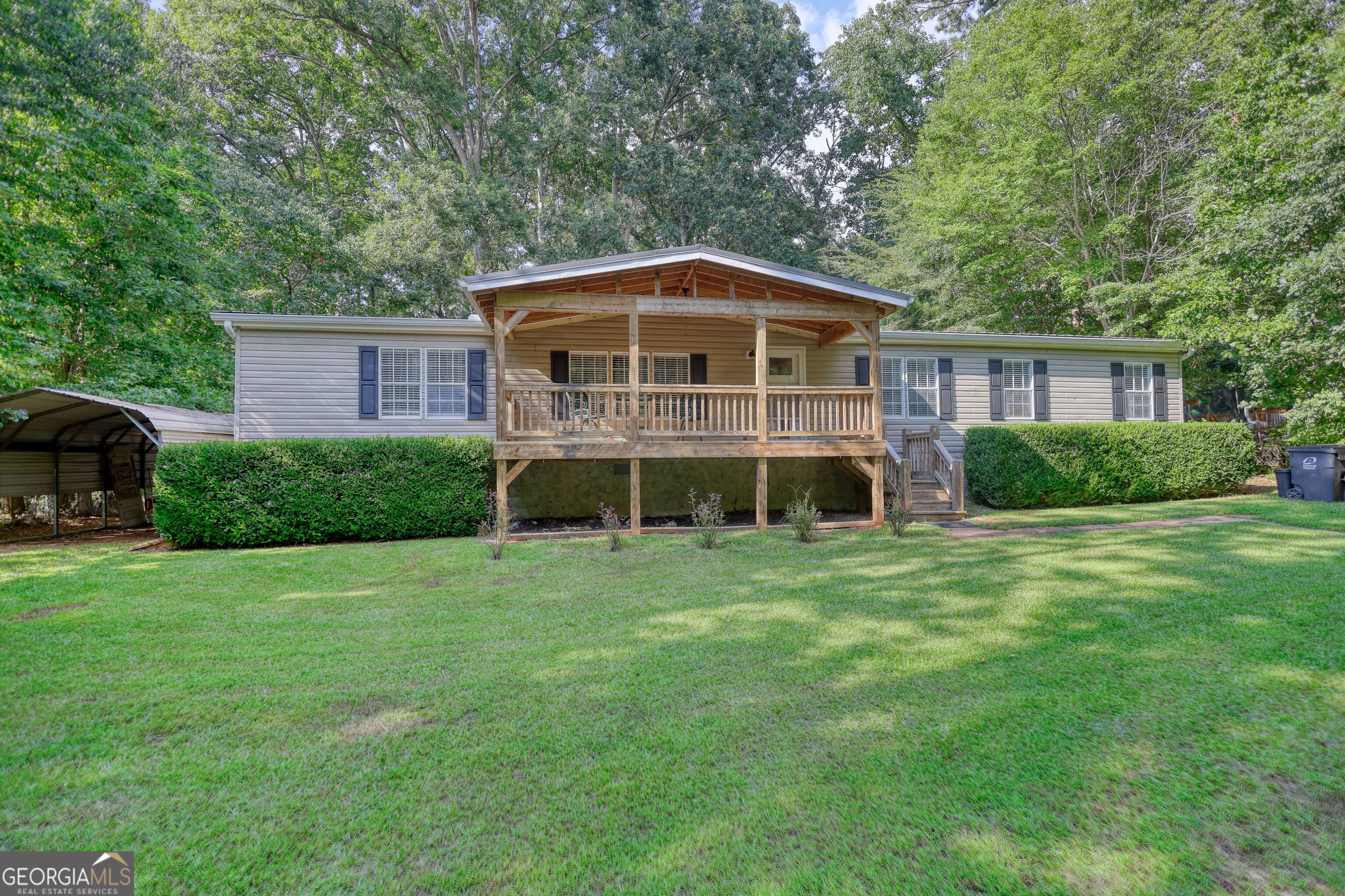 Charming 3-bedroom, 2-bath home in the desirable Turtle Cove community near Lake Jackson. This inviting split-bedroom floor plan offers stylish LVP flooring with cozy carpet in the bedrooms. The spacious family room features a fireplace and opens kitchen & dining room, perfect for gatherings. The kitchen is beautifully appointed with leathered granite countertops, stainless steel appliances and plenty of storage. Enjoy outdoor living on the large front porch, screened porch overlooking the private backyard, or the deck designed for entertaining. A carport and outbuilding provide extra convenience and storage. Just a short walk to Lake Jackson, this home also gives you access to Turtle Cove amenities including a clubhouse, pool, and 9-hole golf course.