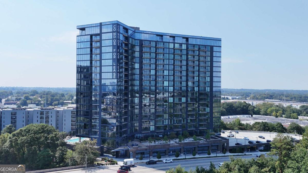 Welcome to urban elegance in the hear of West Midtown! This rare corner unit in the coveted Seven88 high-rise offers sweeping city views and premium finished throughout. Floor-to-ceiling windows that flood the space with natural light and showcase panoramic views of the skyline. A bright open floor plan with wide-plank hardwood flooring and designer touches. Gourmet Kitchen with high-end stainless steel appliances, waterfall quartz countertop island, tile backsplash and soft close drawers/cabinets. Two generously sized master suites each with private baths and walk-in closets. Luxury amenities including 24/7 concierge and security, a fitness center, clubroom, pool & hot tub, plus a covered, deeded two-car parking with EV charger availability. Last but not least it comes with a permanent leasing permit from HOA.