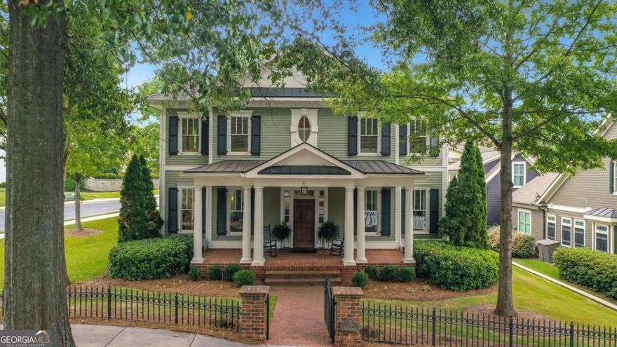 Nestled within the picturesque, gated Walnut Grove subdivision, this stunning luxury home offers the perfect blend of elegance, comfort, and an unbeatable location-just a short stroll to the vibrant Marietta Square and minutes from Kennesaw Mountain National Park and I-75. Boasting four spacious bedrooms, each with its own en suite bathroom, plus a convenient half bath on the main floor, this thoughtfully designed home features a desirable main-level master suite. The heart of the home is a large gourmet kitchen outfitted with top-of-the-line appliances and an expansive island, ideal for entertaining. A beautiful courtyard extends off the living room, perfect for indoor-outdoor living, while the inviting front porch adds timeless curb appeal. This is a rare opportunity to live luxuriously in one of Marietta's most sought-after communities.