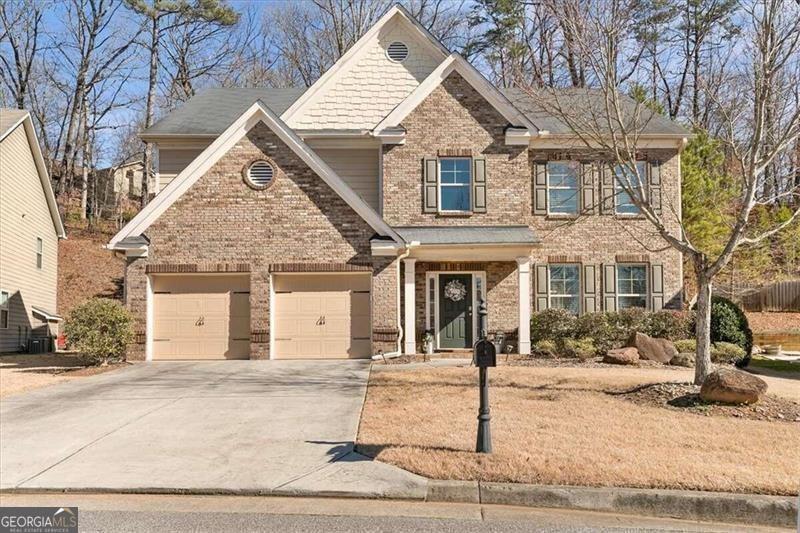 Amazing location - convenient to everything! Just minutes from downtown Kennesaw Mountain State Park, the Marietta Square, shopping and restaurants. Welcome home to this spacious 5 Bedroom/3 full bath traditional brick home. Some of the amazing features include granite counter tops, stainless steel appliances, newer LVP flooring on the main level, and an open concept. There is a guest bedroom on the main and 4 bedroom upstairs - with the master featuring trey ceilings, and an over-sized master bath and master closet. Residents will appreciate the exceptional Community Amenities, including a Clubhouse, Pool, Tennis Courts, Basketball Courts, and a Playground.