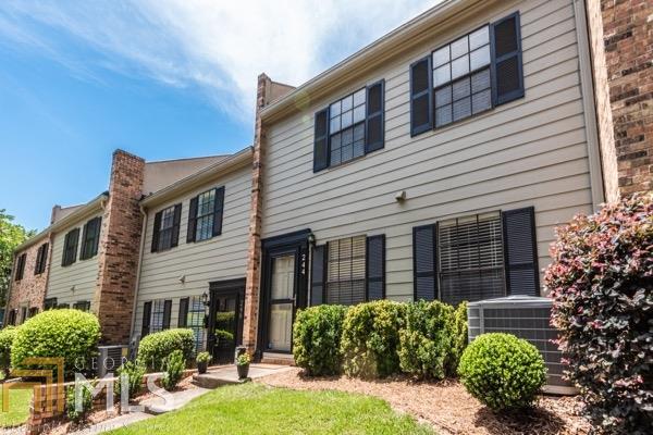 Move right into this delightful 2-bedroom townhome that is situated in a quaint townhome community within blocks of downtown Decatur restaurants/shops. Upon entering you’ll be greeted with hardwoods throughout the home, spacious living room, separate dining area, updated traditional kitchen, and you’ll even find extra hidden storage space in the coat closet & attic + HVAC is 2 yrs old. Upstairs are two large bedrooms separated by a tastefully updated bathroom. The spacious master bedroom includes a private master bathroom plus his/her closets. Head outside the backdoor to the gorgeous private patio to enjoy outdoor dining/entertaining. This townhome includes an attached carport and there are several parking options around the complex for visitors. HOA has a community garden/compost bin + all exteriors were freshly painted in 2019. Conveniently located near Emory/CDC, easy access to Marta, and just across the street from Adair Park and a dog park. Welcome Home! (360 Virtual Tour Available)