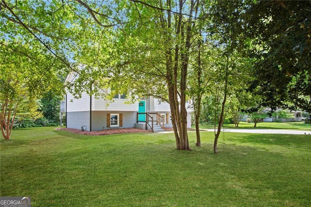 Photo of 350 Roundup Trail, Ellenwood, GA 30294 (MLS # 10704253)