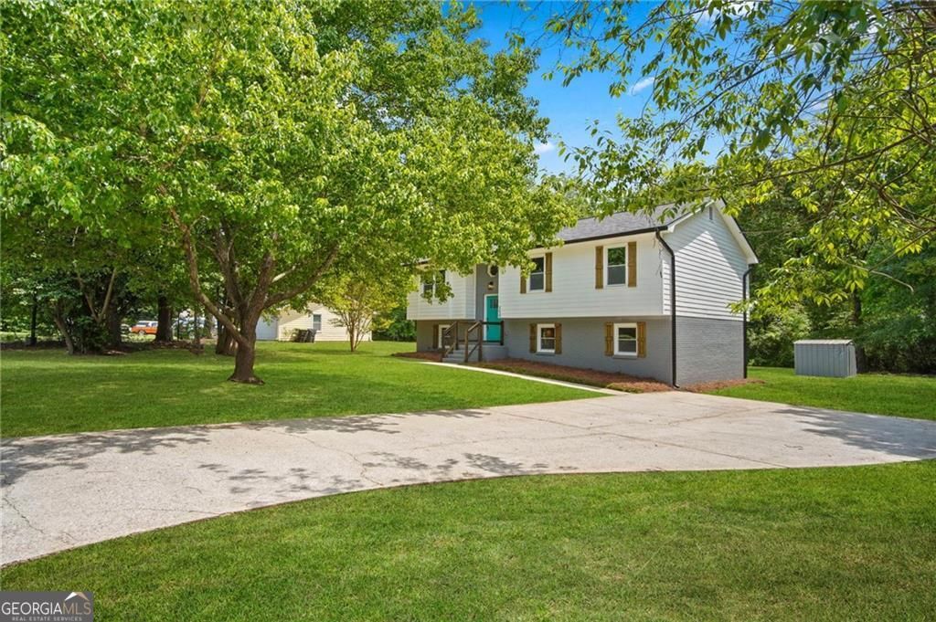 Photo of 350 Roundup Trail, Ellenwood, GA 30294 (MLS # 10704253)